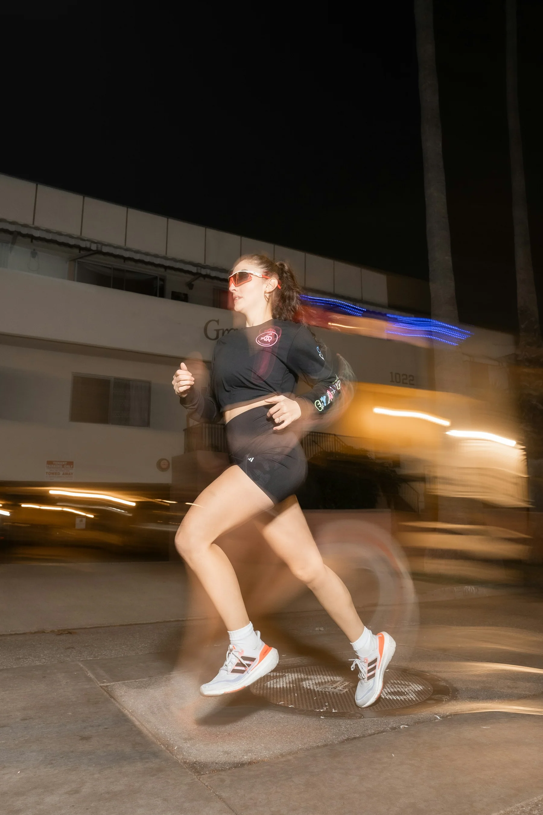 A runner checking training information on a wearable device
