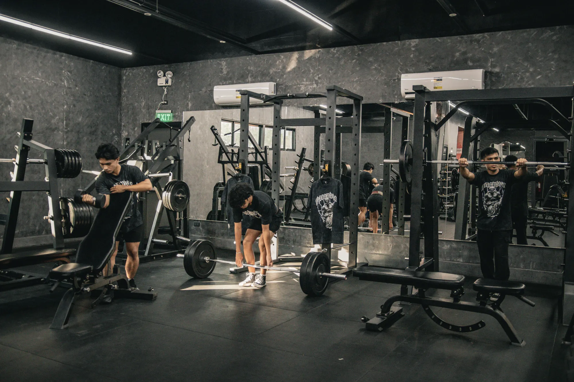 People completing a varied training session in a gym